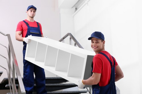 Reliable moving truck helping with loading and transport in Colliers Wood