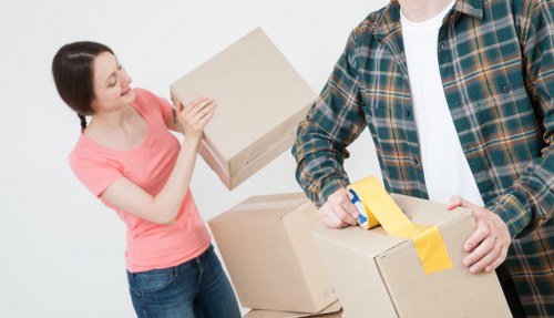 Careful loading of sofas and furniture for a local move