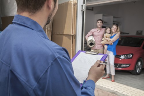 Local moving team handling packing in a flat near Colliers Wood