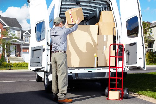 Careful handling of furniture by a local moving team in Colliers Wood