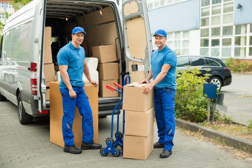 Local team removing an old sofa and other household furniture